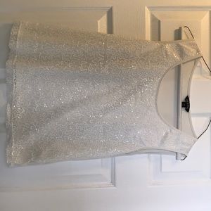 Cream colored, sequins front.